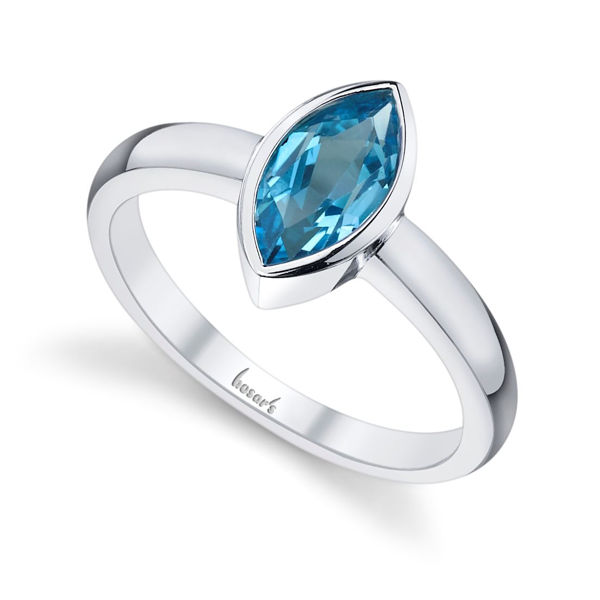 14Kt White Gold Bezel Set Marquise Shaped Blue Topaz Solitaire Ring