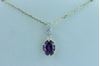 14Kt White and Yellow Gold Oval Amethyst Dangle and Diamond Bale Pendant