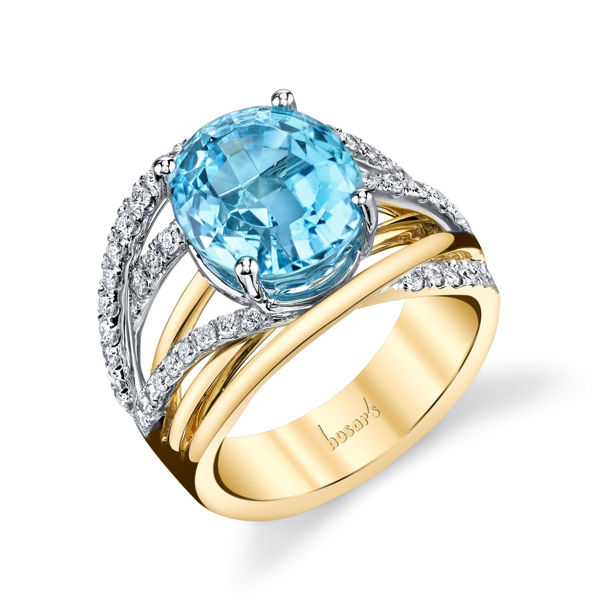 14Kt White and Yellow Gold Modern Multi-band Style Oval Blue Topaz and Diamond Ring