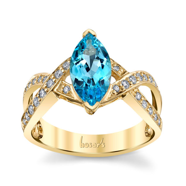 14Kt Yellow Gold Open Swirl Design Marquise Cut Blue Topaz and Diamond Ring
