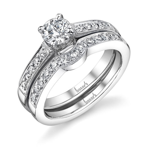14Kt White Gold Cathedral Prong Set Diamond Engagement Ring with Milgrain detail.