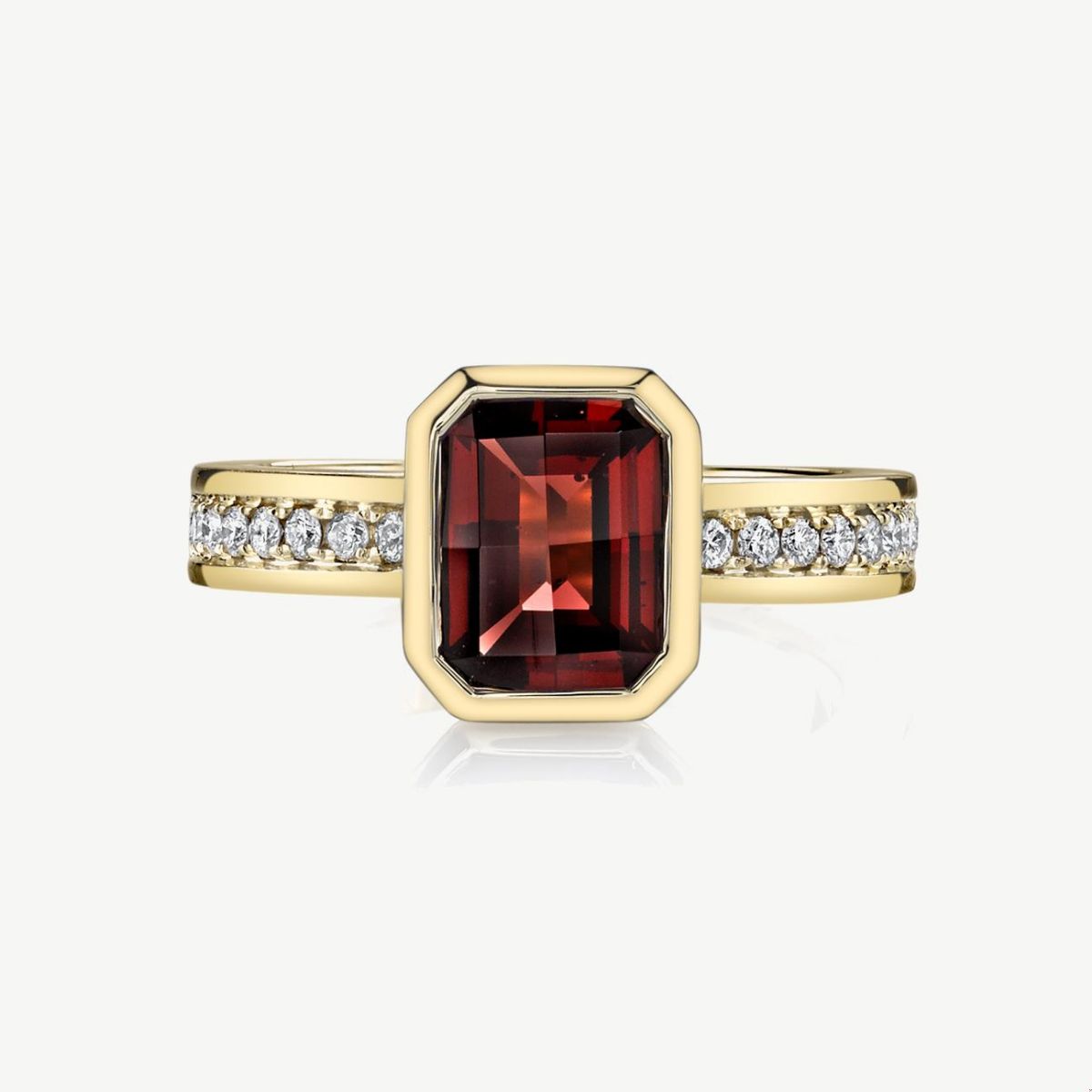 Picture of 14K Gold Pyrope Garnet Emerald Cut Ring with Bezel Set Center and Prong Set Rounds on Shoulders
